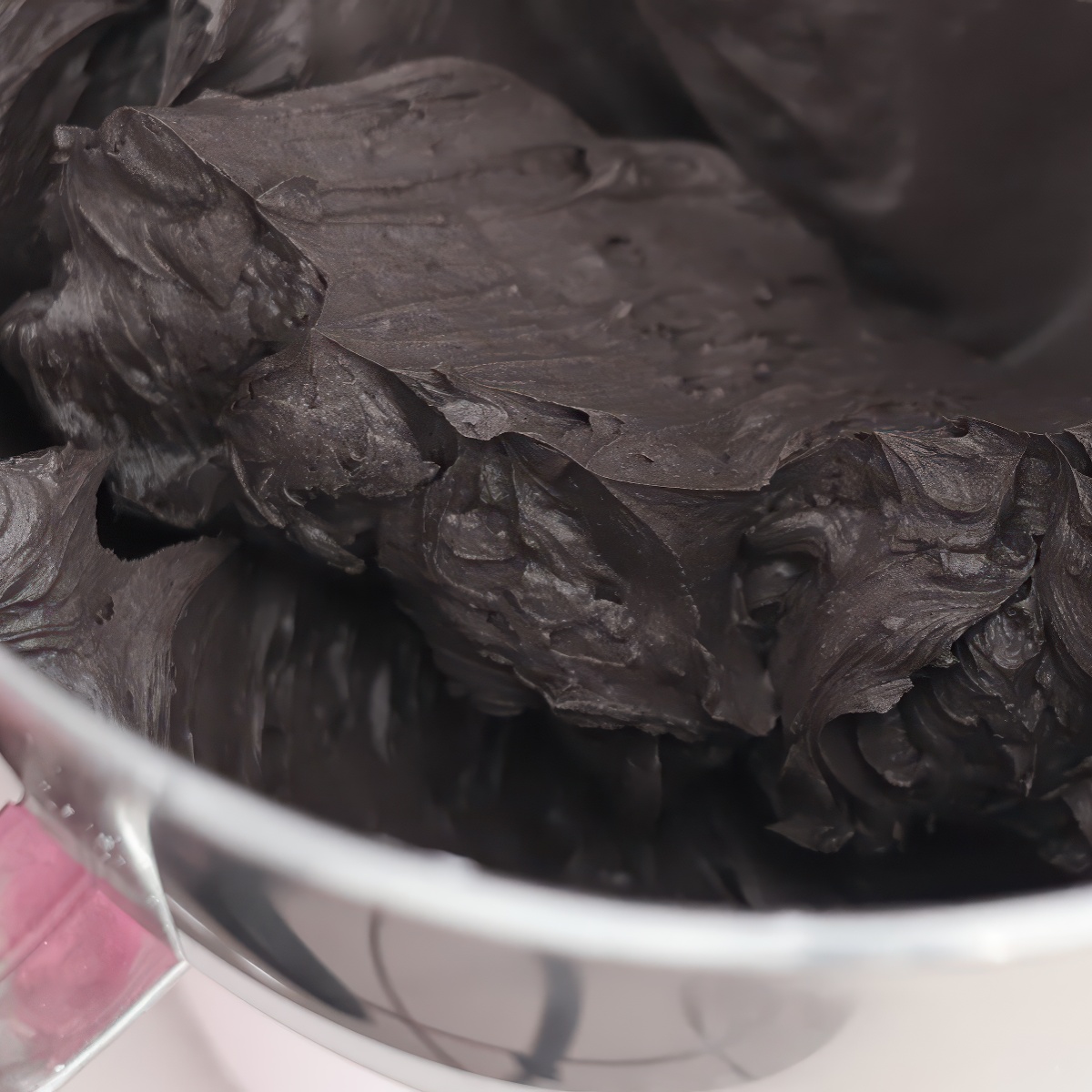 black buttercream in large mixing bowl.
