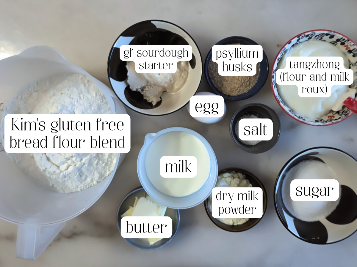 sourdough dinner rolls ingredients measured out and labeled.